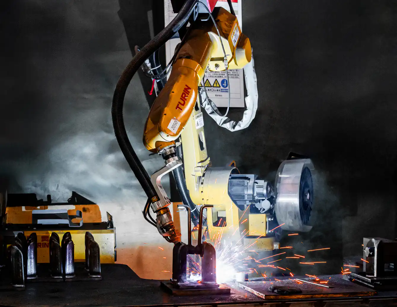 Robotic welding of a metal component